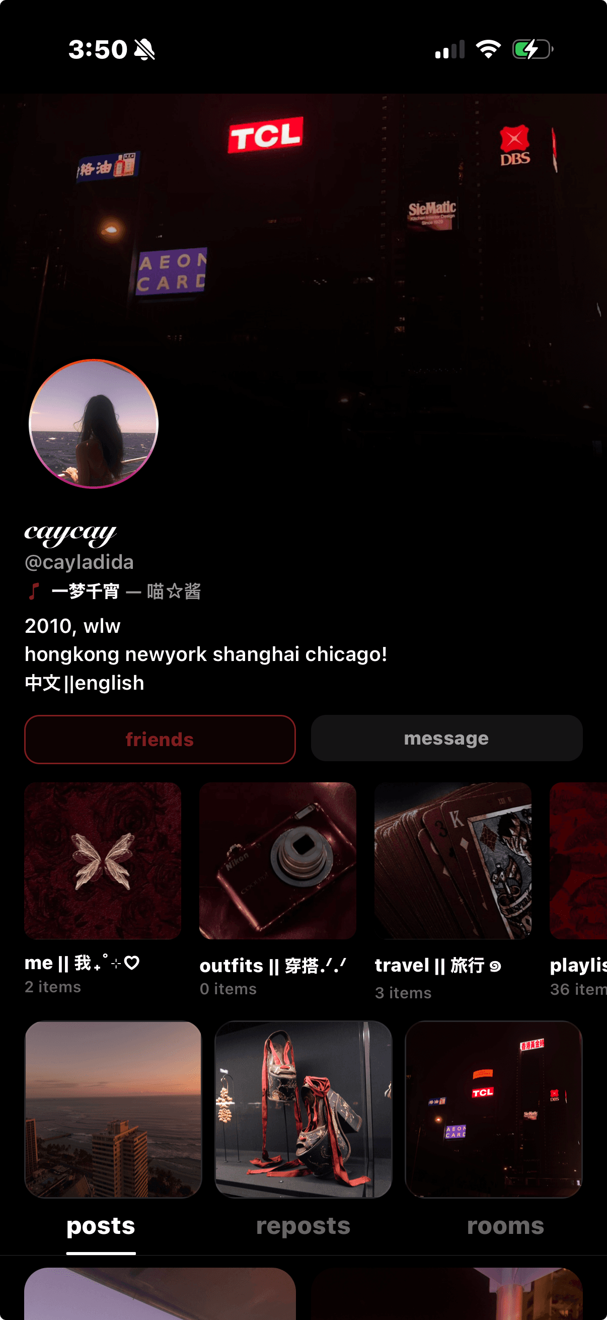 Caycay's Sharespot profile with a nighttime city header.