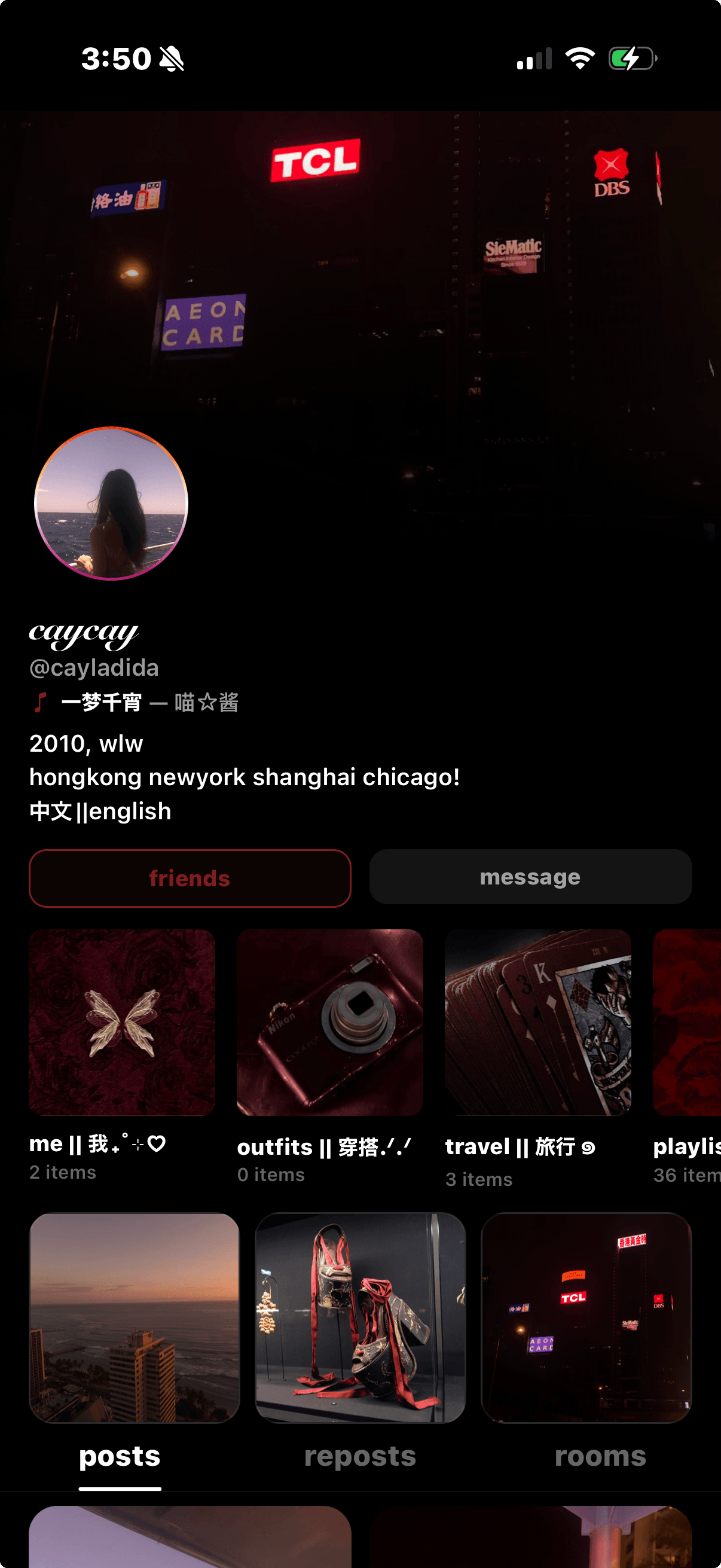Caycay's Sharespot profile with a nighttime city header, ocean avatar, and shelves of posts, outfits, travel, and playlists.